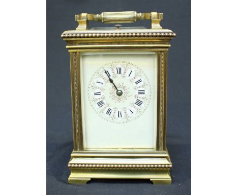 A French, brass cased repeater carriage clock by Richard and Co. striking half hourly, the white dial with Roman numerals den