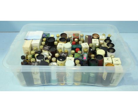 A collection of approximately 103 miniature bottles of single malt Scotch Whisky (in plastic crate)