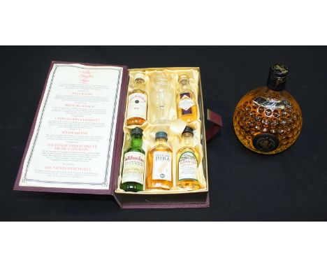 An Old St Andrews blended scotch "Clubhouse" Whisky in golf ball shaped bottle, 700ml 40% alcohol, together with "The single'