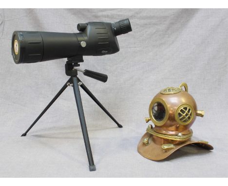 An Optus 20-60 x60 spotting scope on folding tripod, together with a miniature brass and copper novelty divers helmet