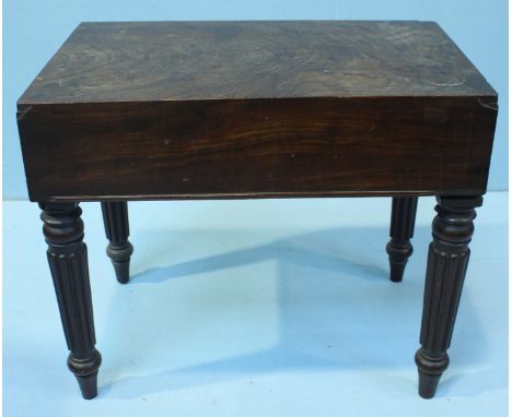 A William IV mahogany Bidet, the top lifting to reveal a large kidney shaped blue and white printed ceramic bowl in fitted co