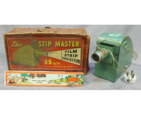 The Strip Master Film strip projector, 35mm film strips, in original box