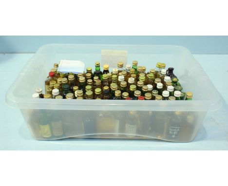 A collection of approximately 128 miniature bottles of Blended Scotch Whisky (in plastic crate)
