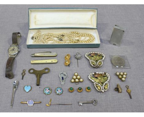 A small collection of assorted costume jewellery and collectables including buckles, pearls, a wristwatch, a lighter, pins an