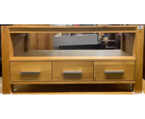 A heavy quality contemporary light oak TV/HiFi stand, 110 x 42 x 55cm.