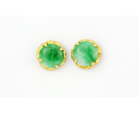 A pair of yellow metal (tested high carat gold) stud earrings set with polished jade, Dia. 0.7cm, (with 9ct gold replacement 