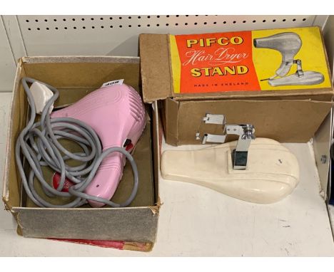 A 1960s pink Pifco hairdryer with original stand (this is a collector's item only).