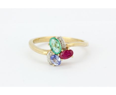 A 9ct yellow gold ring set with an oval cut emerald, ruby, sapphire and diamonds, (P.5).