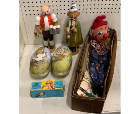A boxed Pelham puppet and other items.