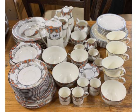 An extensive quantity of Crown Ducal coffee and dinner china, together with a Royal Doulton Lisa pattern tea set.