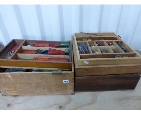 Good selection of vintage Meccano including various colours and parts, condition varies but good overall, in a number of wood