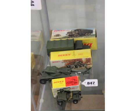 Three boxed French Dinky military vehicles including 824 Army Truck, vg with gd box with marks, 829 Gun Carrier Jeep with can