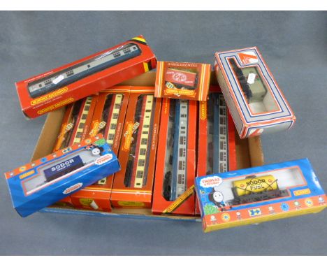 Ten boxed Hornby OO gauge items of rolling stock including two Thomas wagons and eight carriages (R923, R421 x2, R424, R921, 