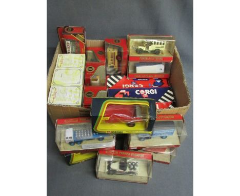23 Boxed vehicles including eleven Matchbox Yesteryear red, two Corgi 56 Tipper Trailer, three Matchbox Collectable's and 7 C