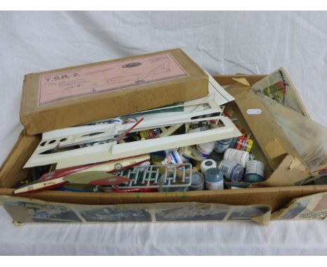 Box of model kit accessories including many paints, spares, part kits etc