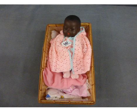 Black Armand Marseille circa 1920-30s marked 351 1k plus a small bisque jointed doll