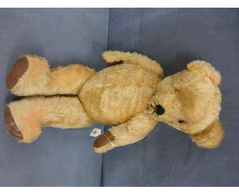 Vintage large English Teddy Bear with damage to leg with one eye missing