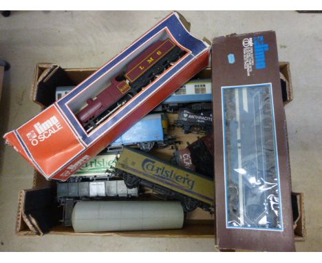 Box of O gauge railway items with two boxed Lima engines including 6572 & 6534 plus a quantity of rolling stock