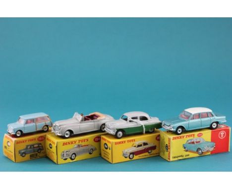 Four boxed Dinky vehicles including 199 Austin Seven Countryman in powder blue vg, box has been defaced to one side, 164 Vaux