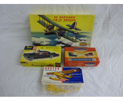 Three boxed vintage model kits including Playcraft Aurora De Haviland DH-10 Bomber, Kleeware Antique Cars 2 and Revell Contin