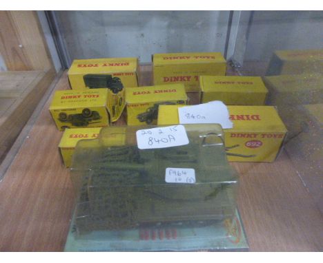 Eight boxed Dinky military vehicles including 690 Scorpion Tank, 692 5.5 Medium Gun, 641 Army 1-Ton Cargo Truck, 621 3 Ton Ar