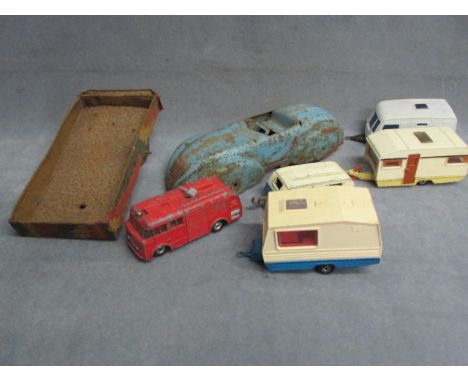 Seven vintage play worn vehicles including Dinky 190 Caravan and Dinky Fire Engine etc