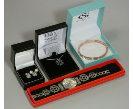 A pair of 9ct gold gem-set earrings; two pairs of cultured pearl ditto; a Swatch ladies’ wristwatch; a silver pendant; &amp; 