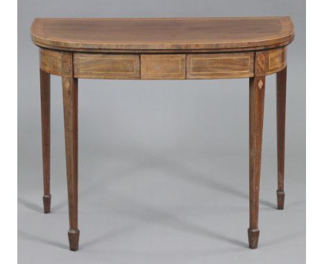 A regency mahogany &amp; satinwood crossbanded demi-lune card table, inset green baize to the fold-over top, on slender squar