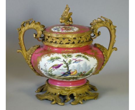 A mid-19th century English porcelain &amp; ormolu-mounted vase &amp; cover of squat round form, with finely painted reserves 