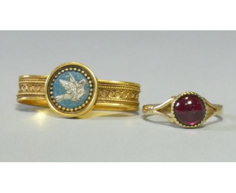 A yellow metal ring set foil-backed spinel cabochon, size M, 2.1g; &amp; a yellow metal scarf ring set circular micro-mosaic 