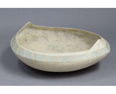 A large studio pottery coracle-shaped vessel with pointed ends &amp; painted decoration in muted blues, white &amp; ivory, 18