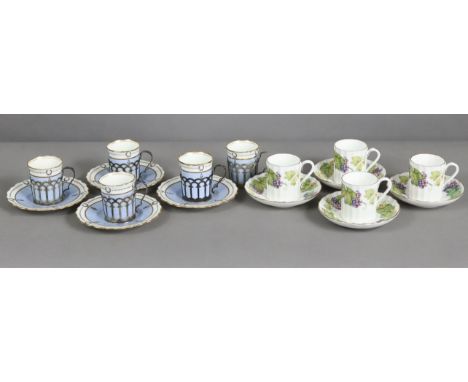 Five Aynsley porcelain coffee cans with pierced silver holders (Sheffield 1923, one saucer &amp; two cans cracked); &amp; fou