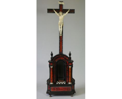 A 17th/18th century FLEMISH CARVED IVORY, EBONY, &amp; TORTOISESHELL CRUCIFIX FIGURE, with Christ on the cross above an archi