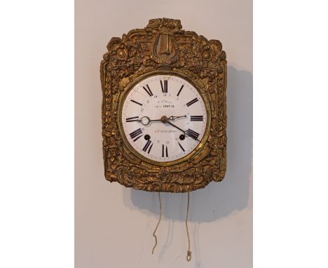 A 19th century French comtoise wall clock, the 9” diam. white enamel convex dial inscribed: “Cyprien Chaumeil áSt. Julien-Lam