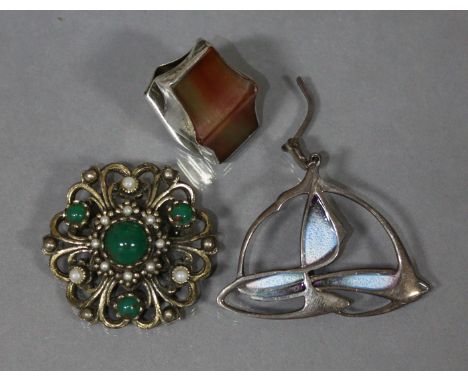 A Scottish silver &amp; pale blue enamel Art Nouveau style openwork brooch by Pat Cheney, 1¾” wide; a modernist ring set agat