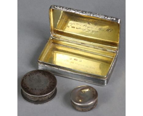 A William IV silver snuff box of rectangular form, with engine-turned decoration &amp; foliate handle, the gilt interior with