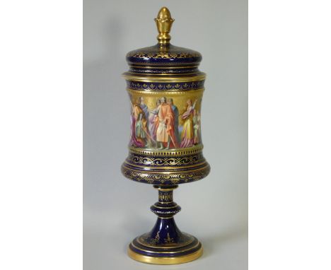 A ‘VIENNA’ PORCELAIN VASE &amp; COVER of waisted cylindrical form, with cone finial &amp; on round pedestal foot, deep blue g