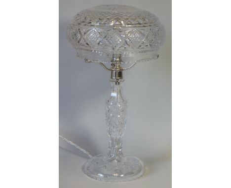 A good quality heavy cut glass table lamp with 9½” diam. domed shade, on slender column &amp; circular foot; 17¼” high.