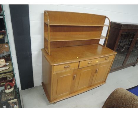 A vintage Priory sideboard with shelf back