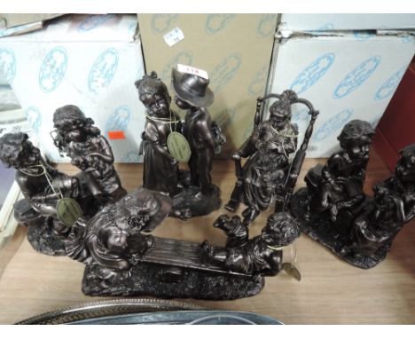 Five Juliana Collection figure groups, Children Playing and Grandmother in rocking chair