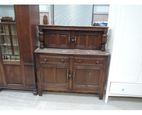 An Ercol style sideboard/court cupboard