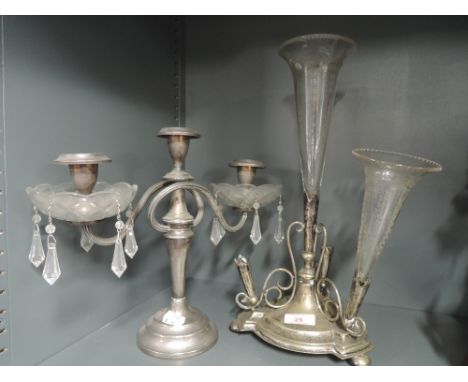 A Victorian epergne AF and similar three stem plated candle stick