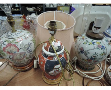 A selection of ceramic bodied table lamps including Chinese style