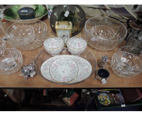 A selection of crystal glass wares and ceramics including Mintons Petunia and Angelus carriage clock