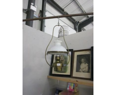 A hanging oil lamp