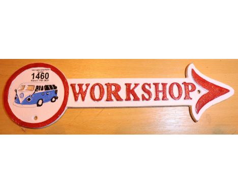 Cast iron VW Workshop arrow plaque, L: 41 cm. P&amp;P Group 2 (£18+VAT for the first lot and £3+VAT for subsequent lots) 