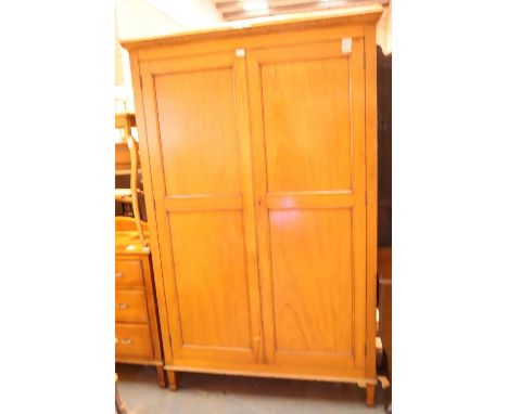 Light oak two door wardrobe, 115 x 46 x 192 cm H. Not available for in-house P&amp;P, contact Paul O'Hea at Mailboxes on 0192