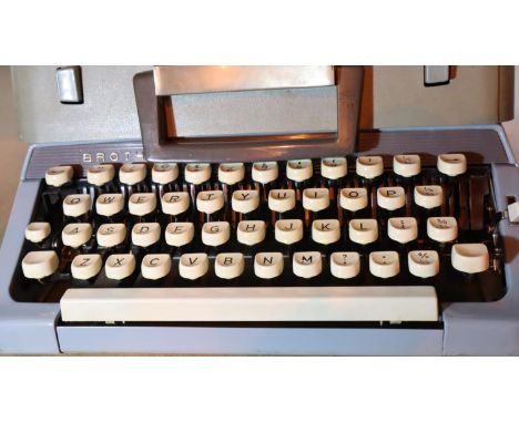 Cased Brother manual typewriter. Not available for in-house P&amp;P, contact Paul O'Hea at Mailboxes on 01925 659133 