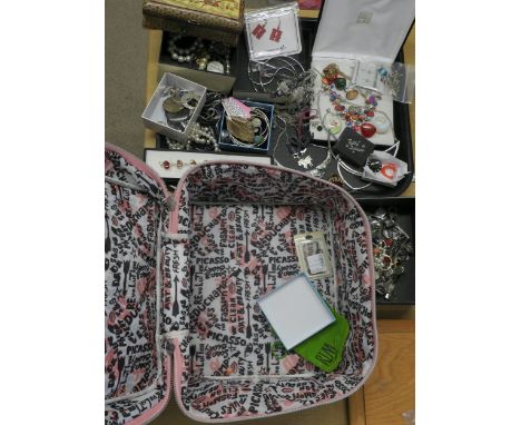 A large Soap &amp; Glory travel case full of vintage and modern silver and costume jewellery to include a silver &amp; cord, 