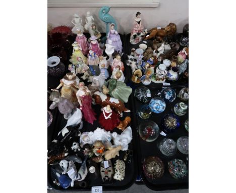 A collection of assorted figures including Lomonosov, animals, a Royal Copenhagen Swift, otter etc, Beswick, Royal Doulton an